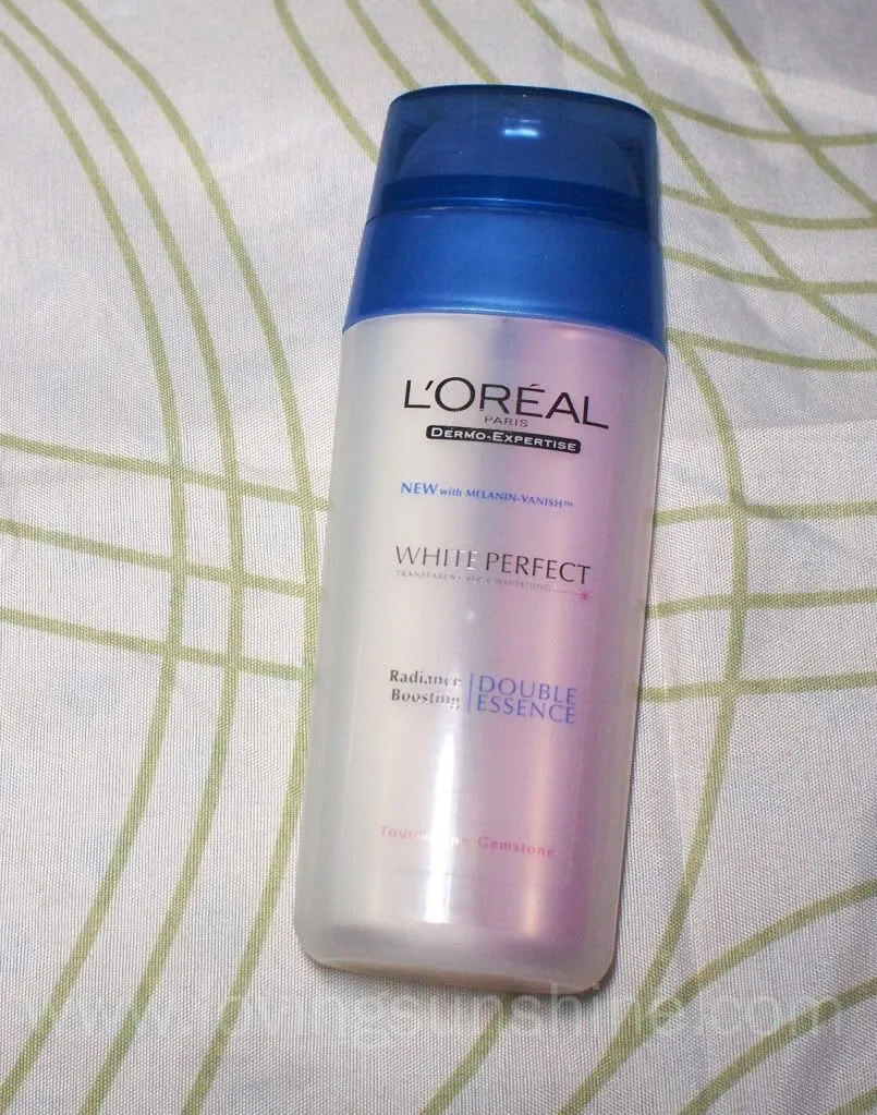 /img/24799-loreal-whitening-essence-application-process.webp