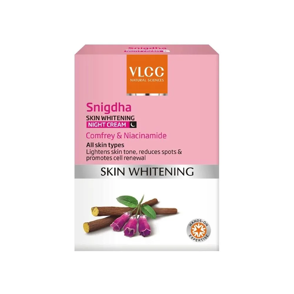 24832 woman applying night cream
